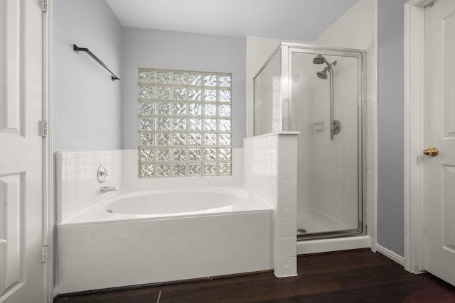 8922 Eaglecove Dr, Houston, TX 77064 - bathroom featuring a shower stall, wood finished floors, and a garden tub