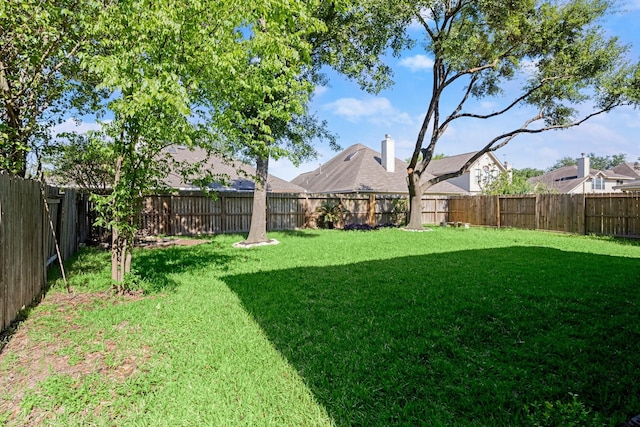 8922 Eaglecove Dr, Houston, TX 77064 - view of yard featuring a fenced backyard