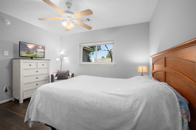 8922 Eaglecove Dr, Houston, TX 77064 - bedroom featuring visible vents, baseboards, ceiling fan, and dark wood finished floors
