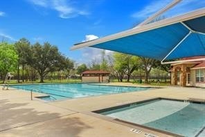 8922 Eaglecove Dr, Houston, TX 77064 - pool featuring a patio area