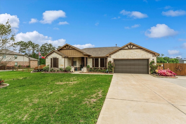 9791 Waller St, Conroe, TX 77303 - view of front facade featuring board and batten siding, stone siding, fence, an attached garage, and driveway