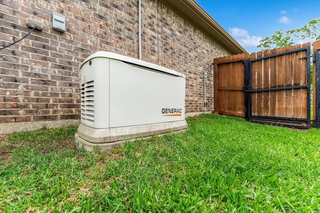 9791 Waller St, Conroe, TX 77303 - exterior details featuring brick siding, a power unit, and fence