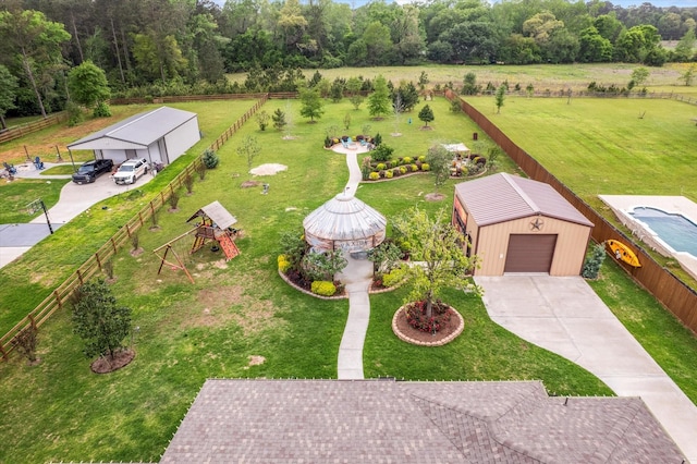 9791 Waller St, Conroe, TX 77303 - birds eye view of property featuring a rural view