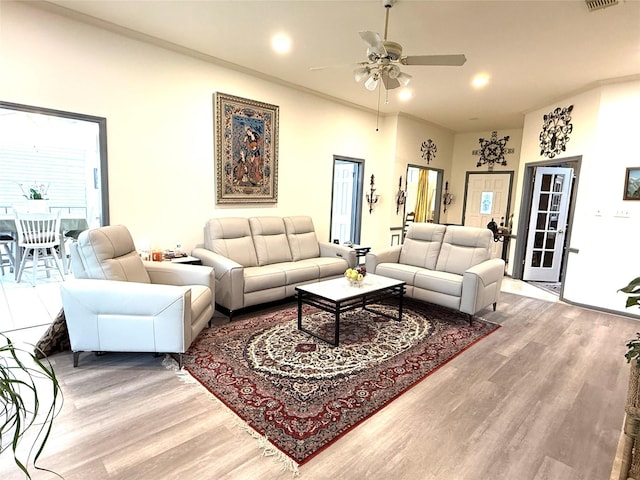 7615 Clover Canyon Cir, Houston, TX 77095 - living room featuring wood finished floors, a ceiling fan, and recessed lighting