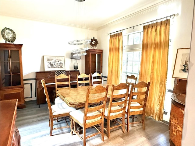 7615 Clover Canyon Cir, Houston, TX 77095 - dining room featuring ornamental molding and wood finished floors