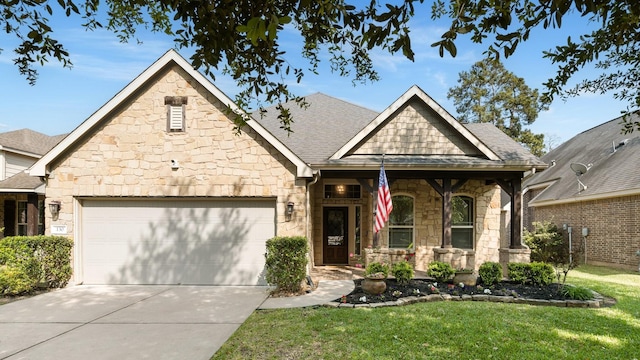 craftsman-style house with stone siding, roof with shingles, concrete driveway, an attached garage, and a front lawn