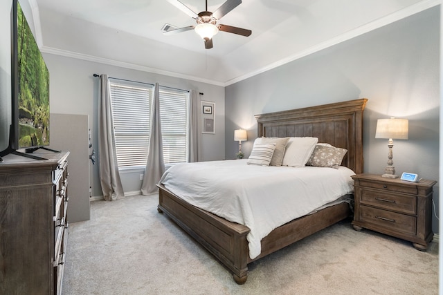 bedroom featuring a ceiling fan, a raised ceiling, ornamental molding, and light colored carpet