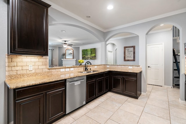 kitchen with dishwasher, a ceiling fan, a sink, and light stone counters