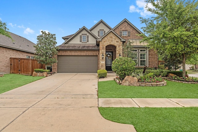 11202 Puckett River Dr, Cypress, TX 77433 - tudor house featuring concrete driveway, stucco siding, a garage, brick siding, and stone siding