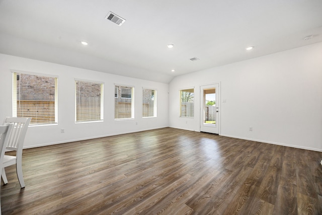 unfurnished living room featuring recessed lighting, dark wood finished floors, visible vents, and baseboards