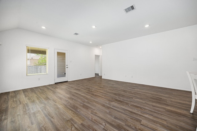 unfurnished living room with recessed lighting, dark wood finished floors, visible vents, and baseboards