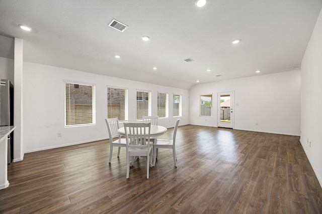 dining area with dark wood finished floors, baseboards, visible vents, and recessed lighting