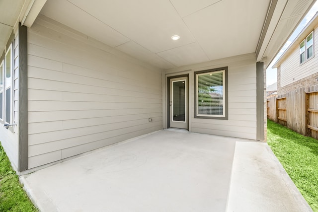 view of patio with fence
