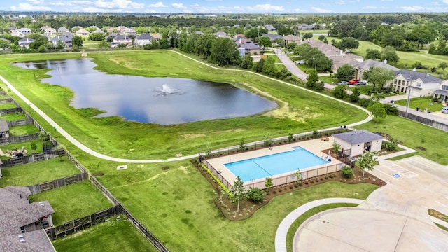 aerial view with a water view and a residential view