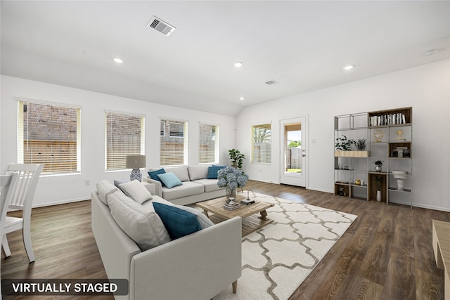 living room featuring baseboards, wood finished floors, visible vents, and recessed lighting