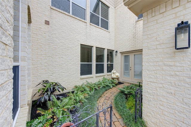 13214 Dusty Grove Ln, Sugar Land, TX 77498 - view of property exterior featuring french doors