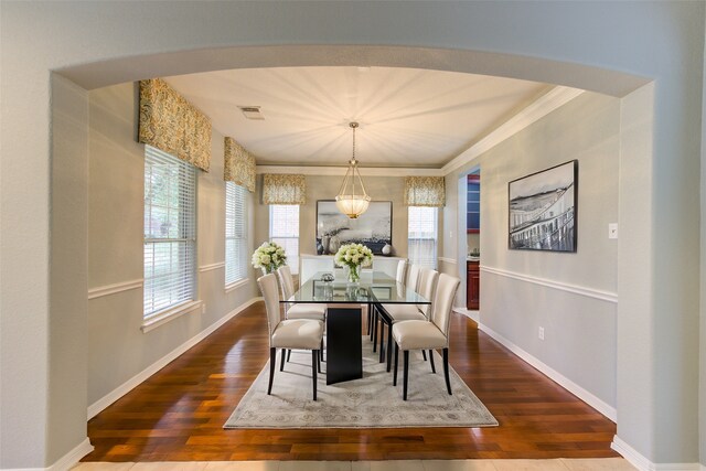 13214 Dusty Grove Ln, Sugar Land, TX 77498 - dining area featuring wood finished floors, baseboards, and ornamental molding