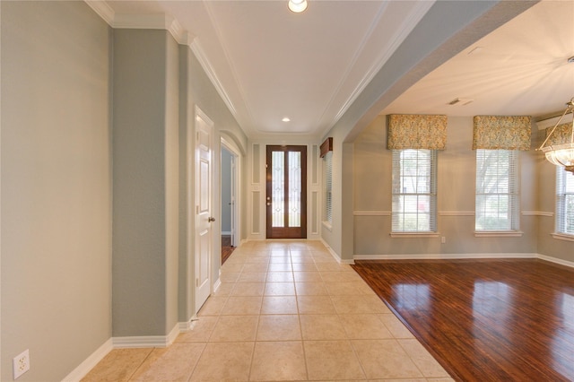 13214 Dusty Grove Ln, Sugar Land, TX 77498 - foyer entrance featuring crown molding, light tile patterned floors, and recessed lighting