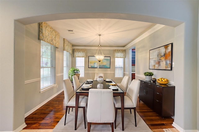 13214 Dusty Grove Ln, Sugar Land, TX 77498 - dining space featuring dark wood-style flooring and crown molding