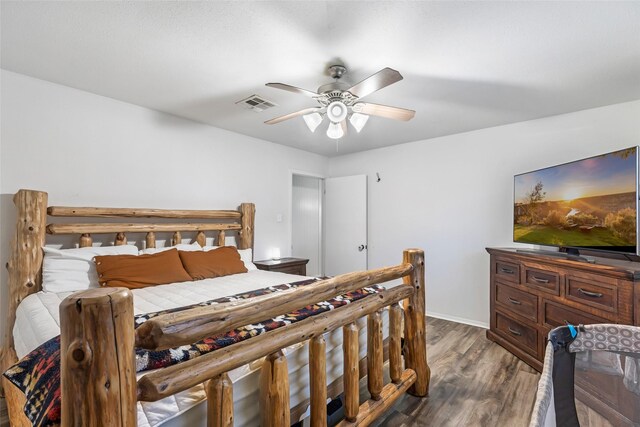 507 E Linney St, Dayton, TX 77535 - bedroom featuring visible vents, a ceiling fan, and wood finished floors