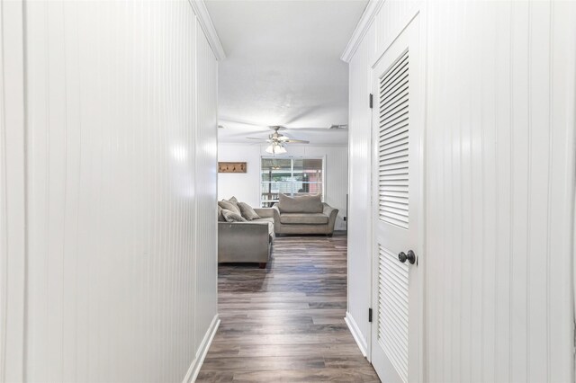 507 E Linney St, Dayton, TX 77535 - hall featuring dark wood-type flooring and baseboards