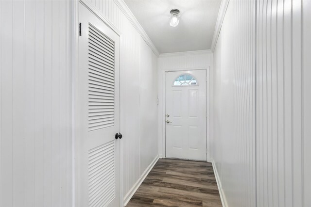 507 E Linney St, Dayton, TX 77535 - doorway with baseboards, crown molding, and dark wood-style flooring