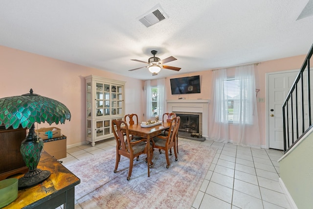 6506 Kentwick Dr, Houston, TX 77084 - dining room with light tile patterned floors, plenty of natural light, stairs, and visible vents