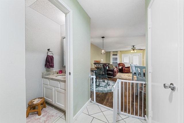 6506 Kentwick Dr, Houston, TX 77084 - interior space with baseboards and light tile patterned floors