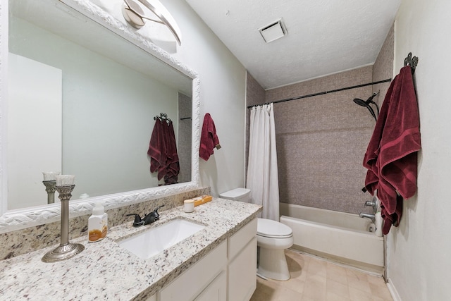 6506 Kentwick Dr, Houston, TX 77084 - full bath with toilet, shower / tub combo with curtain, vanity, a textured ceiling, and visible vents