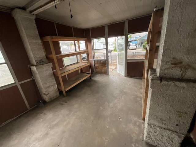 misc room with concrete flooring