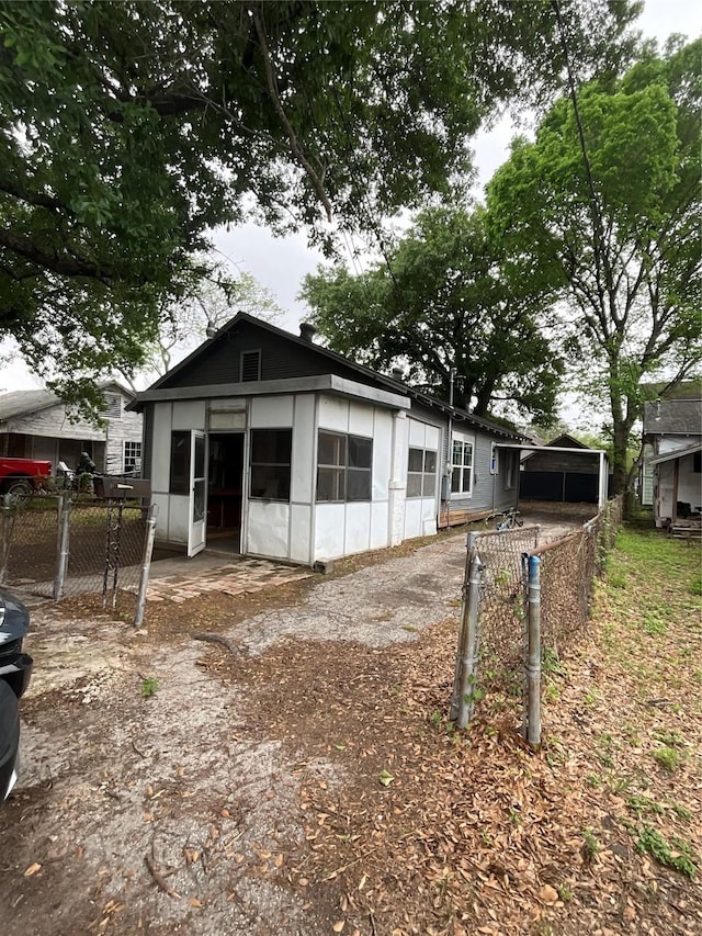 view of front of property with fence