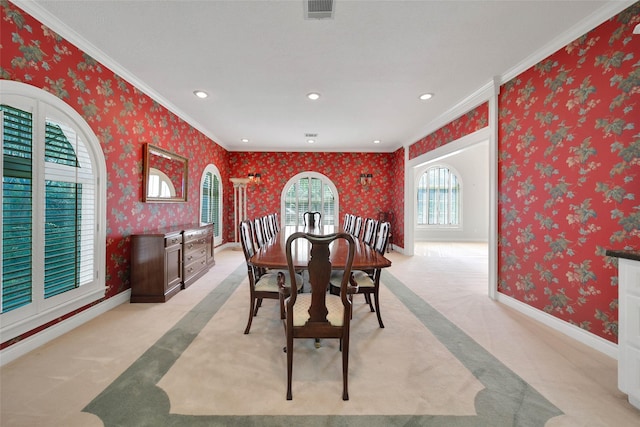 5 Briarwood Dr, Conroe, TX 77301 - dining room featuring visible vents, baseboards, crown molding, recessed lighting, and wallpapered walls