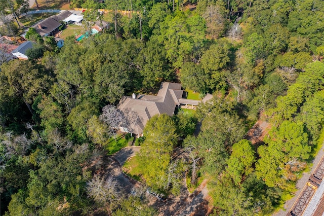 5 Briarwood Dr, Conroe, TX 77301 - drone / aerial view with a view of trees