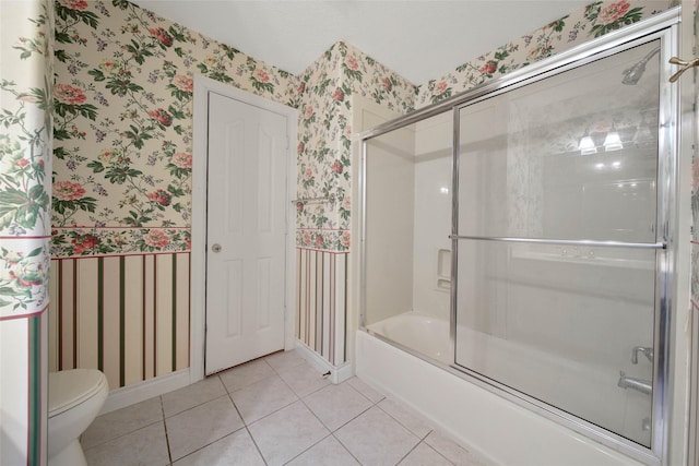 5 Briarwood Dr, Conroe, TX 77301 - full bathroom featuring baseboards, toilet, enclosed tub / shower combo, wallpapered walls, and tile patterned flooring