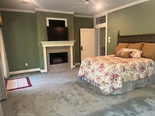 5 Briarwood Dr, Conroe, TX 77301 - bedroom featuring a tiled fireplace, carpet flooring, baseboards, and ornamental molding