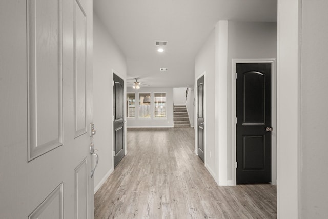 12627 Beddington Ct, Tomball, TX 77375 - hallway featuring stairway, light wood-type flooring, baseboards, and recessed lighting