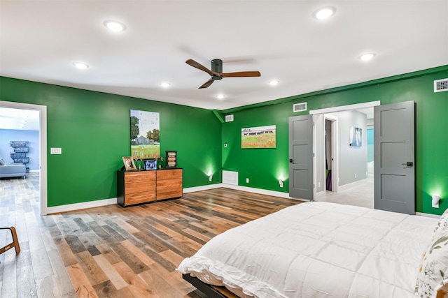 2415 Church St, Galveston, TX 77550 - bedroom featuring visible vents, recessed lighting, and wood finished floors