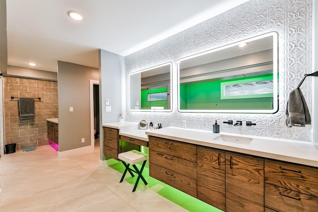2415 Church St, Galveston, TX 77550 - full bathroom featuring recessed lighting, backsplash, tile patterned flooring, and vanity
