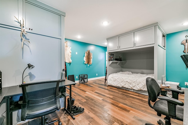 2415 Church St, Galveston, TX 77550 - bedroom with recessed lighting, baseboards, and wood finished floors