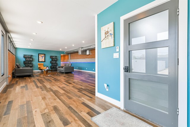 2415 Church St, Galveston, TX 77550 - entrance foyer featuring baseboards, wood finished floors, and recessed lighting