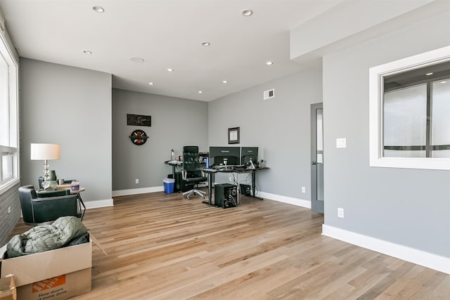 2415 Church St, Galveston, TX 77550 - home office with baseboards, recessed lighting, visible vents, and light wood-style floors