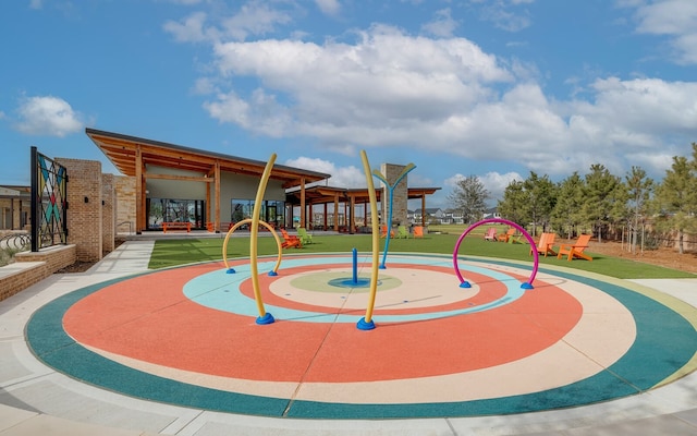 7323 Perching Hawk Trl, Katy, TX 77493 - view of playground featuring a lawn