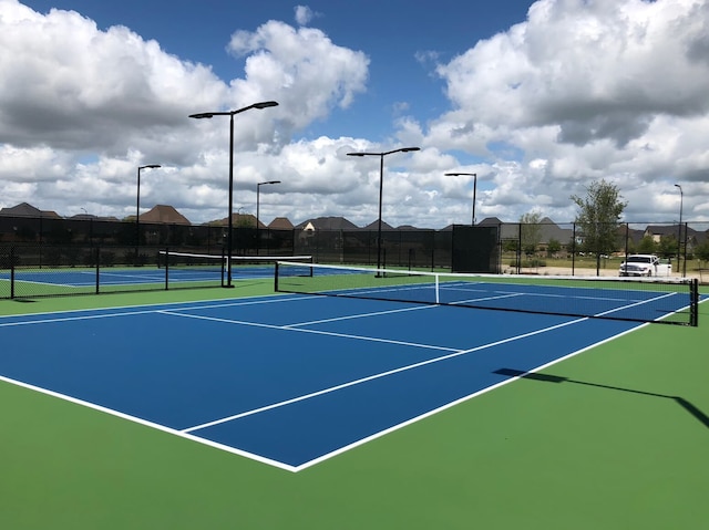 7323 Perching Hawk Trl, Katy, TX 77493 - view of tennis court featuring community basketball court and fence