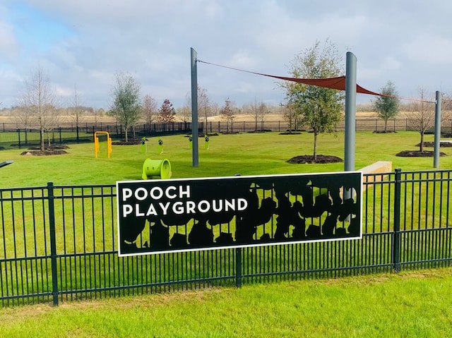 7323 Perching Hawk Trl, Katy, TX 77493 - community sign with a rural view, fence, and a lawn