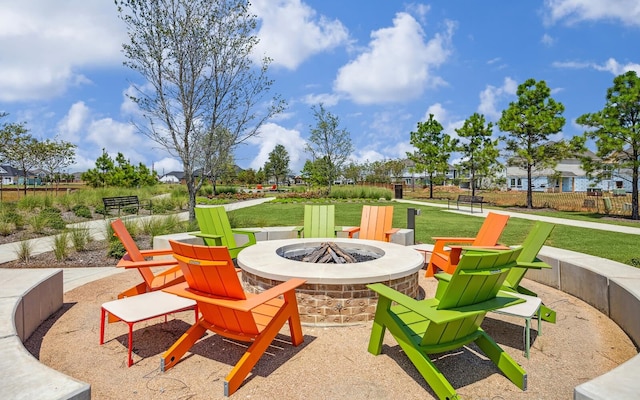 7323 Perching Hawk Trl, Katy, TX 77493 - view of patio featuring an outdoor fire pit