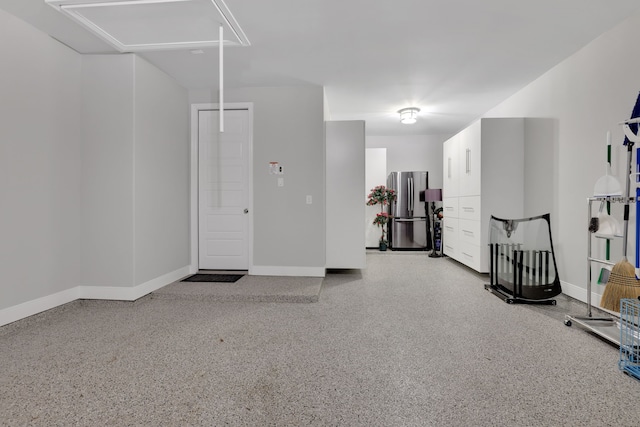 5119 Long Branch Bnd, Fulshear, TX 77441 - interior space with dark aggregate flooring and baseboards