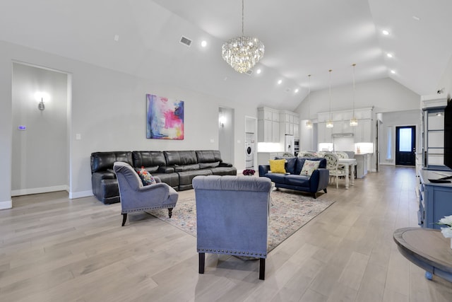 5119 Long Branch Bnd, Fulshear, TX 77441 - living room featuring a chandelier, high vaulted ceiling, light wood-style flooring, recessed lighting, and baseboards