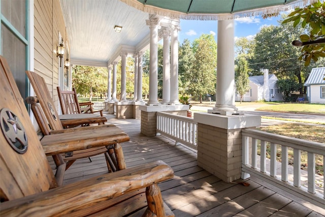 712 Lamar Ave, Crockett, TX 75835 - deck featuring a porch