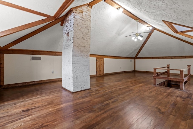 712 Lamar Ave, Crockett, TX 75835 - additional living space with hardwood / wood-style flooring, a ceiling fan, vaulted ceiling with beams, a textured ceiling, and visible vents