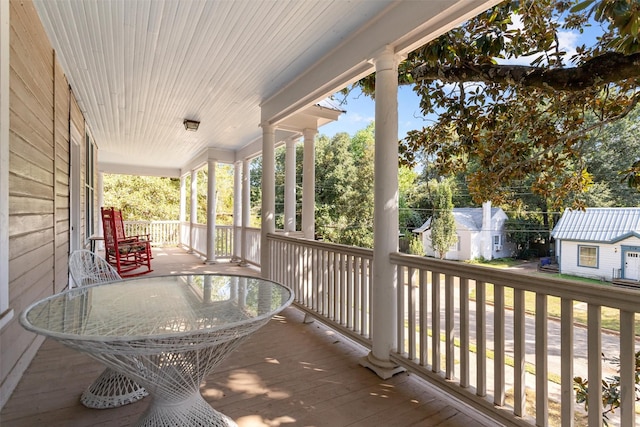 712 Lamar Ave, Crockett, TX 75835 - wooden terrace with a porch